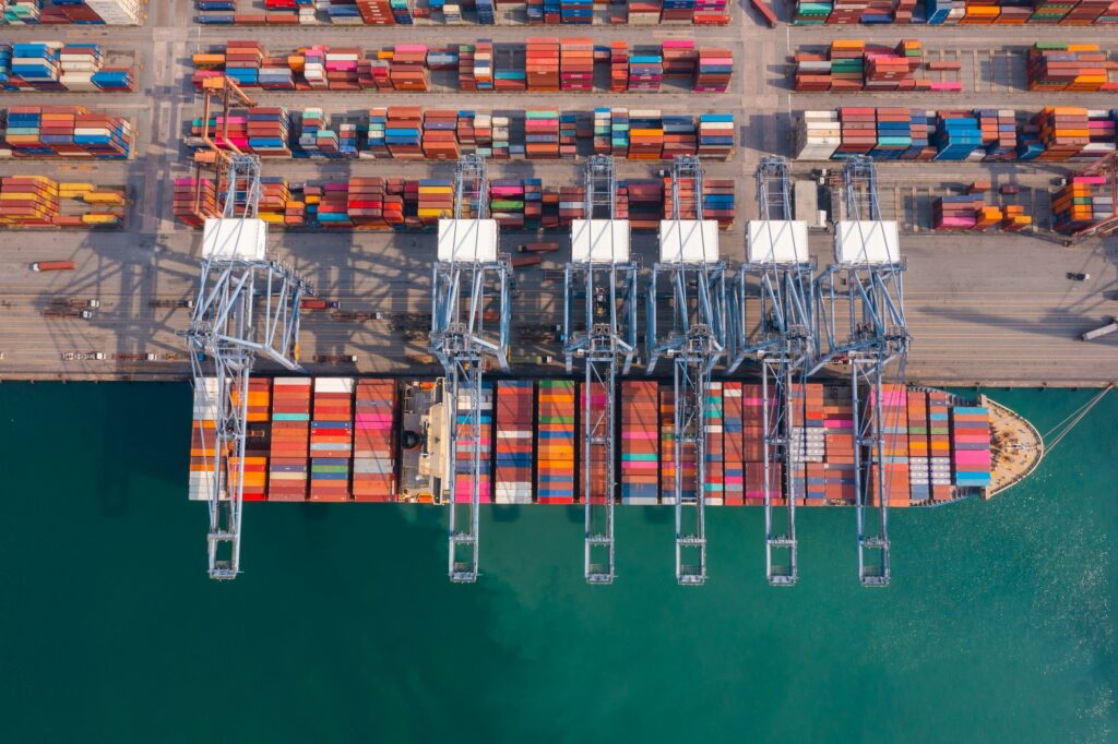 Aerial top view of container cargo ship in the export and import business and logistics